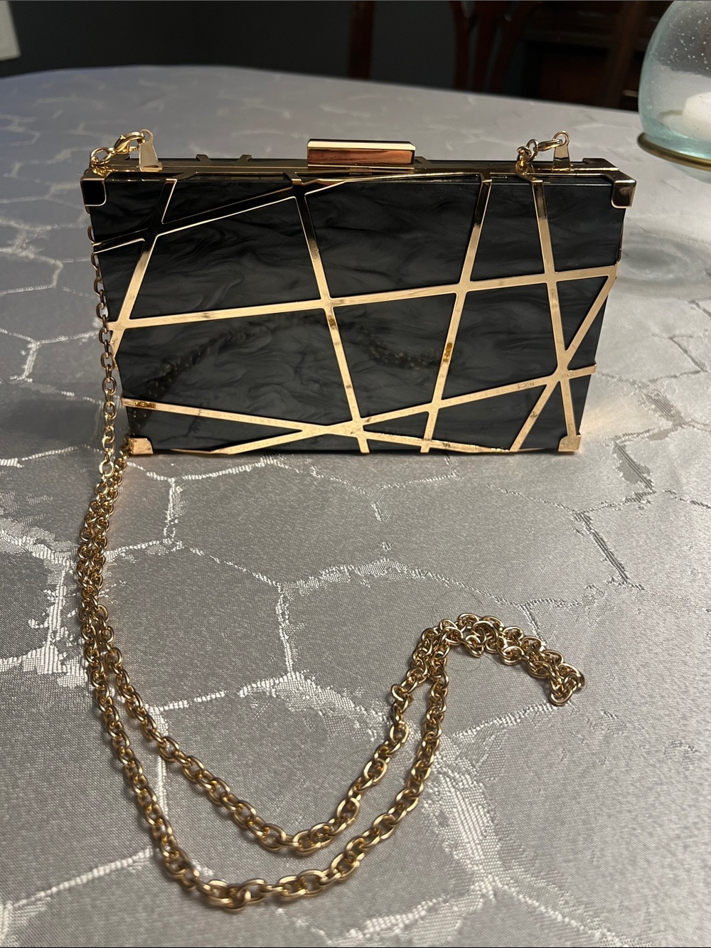 Like Dreams Laser Gold-Accented Black Acrylic Crossbody Clutch
